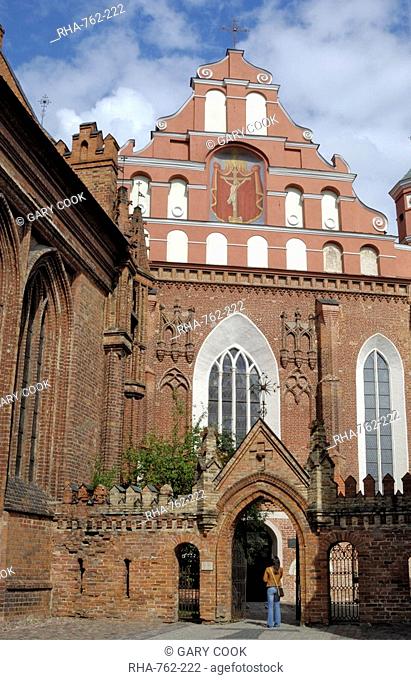 Bernardine church and monastery with a woman standing in the gateway, Vilnius, UNESCO World Heritage Site, Lithuania, Baltic States, Europe