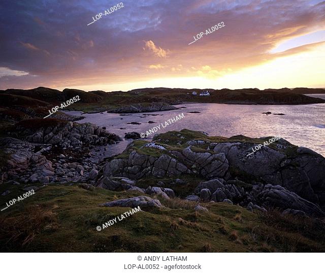 Scotland, Argyll and Bute, Isle of Mull, A solitary cottage on the coast near Kintra, north of Fionnphort. The village of Fionnphort has around 70 inhabitants
