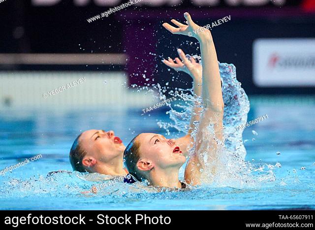 RUSSIA, KAZAN - DECEMBER 10, 2023: Swimmers Valeria Volosach and Margarita Kirilyuk of Belarus perform their duet technical routine during the Synchronised...