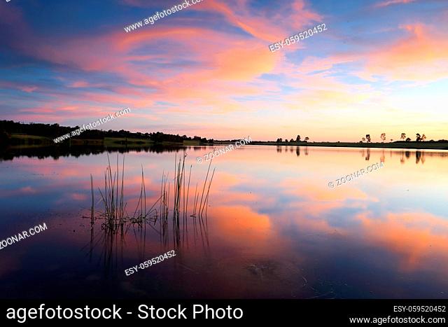 Sensational sunset over Duralia Lake, Penrith Lakes, Australia