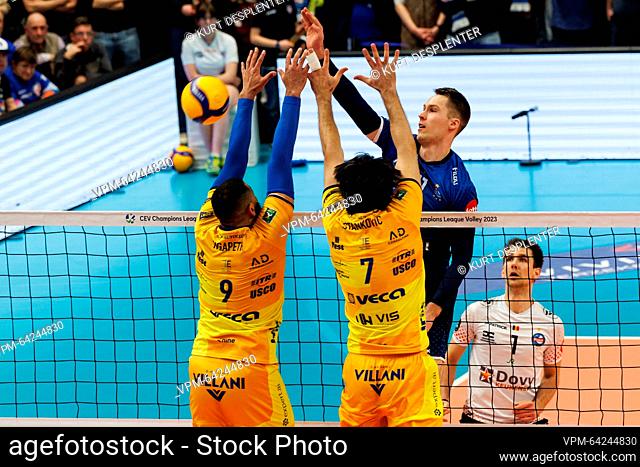 Modena's Earvin Ngapeth, Modena's Dragan Stankovic and Roeselare's Mart Tammearu fight for the ball during a volleyball match between Knack Roeselare and Modena