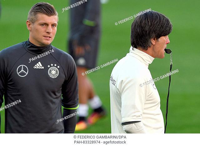 Head coach Joachim Loew (R) and Toni Kroos of Germany during a team training session at the Ullevaal stadium in Oslo, Norway, 03 September 2016