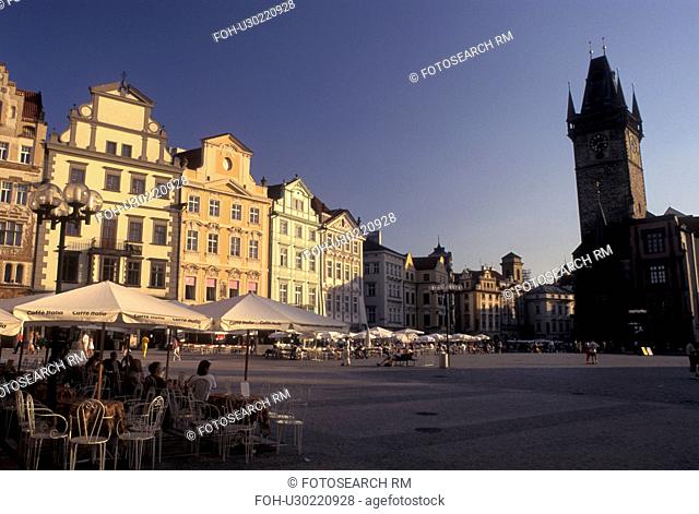 Prague, Praha, Czech Republic, Central Bohemia, Outdoor cafT and Old Town Hall in Old Town Square in the city of Prague