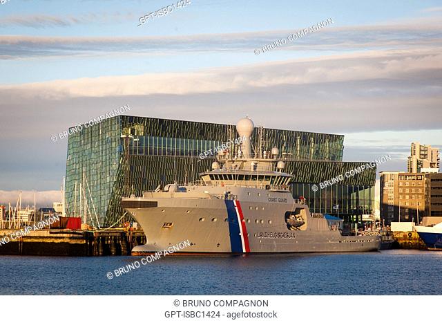 THE COAST GUARD'S FLAGSHIP IN FRONT OF THE HARPA CONCERT HALL AND CONVENTION CENTER, OLD PORT OF REYKJAVIK IN THE LIGHT OF THE MIDNIGHT SUN, REYKJAVIK