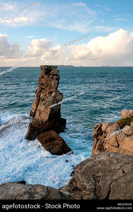 Peniche sea cliffs with Berlengas Island on the background with atlantic ocean, in Portugal