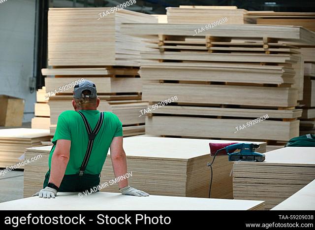 RUSSIA, GALICH - MAY 18, 2023: An employee works at the Galich Plywood Mill, a subsidiary of Segezha Group. The mill's design capacity is 125