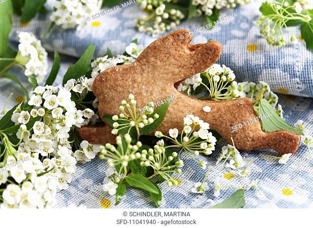 A rabbit-shaped biscuit and spiraea