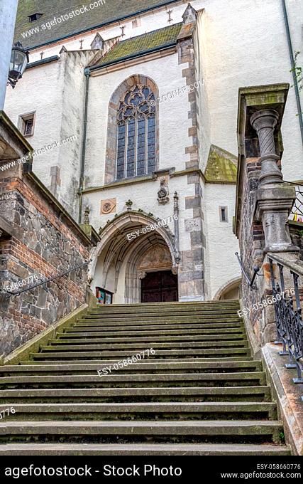stairs and entrance to St. Vitus church in Cesky Krumlov without people