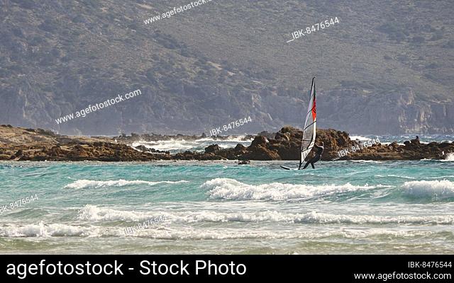 Windsurfers, surf, green foamed sea, reef, mountains, Elafonissi beach, Southwest Crete, Crete Island, Greek Islands, Greece, Europe