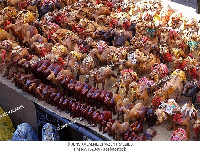 Several camel figures are offered for sale as souvenirs on a market in Marrakech, Morocco, 07 November 2015. Photo: Jens Kalaene - NO WIRE SERVICE - | usage...