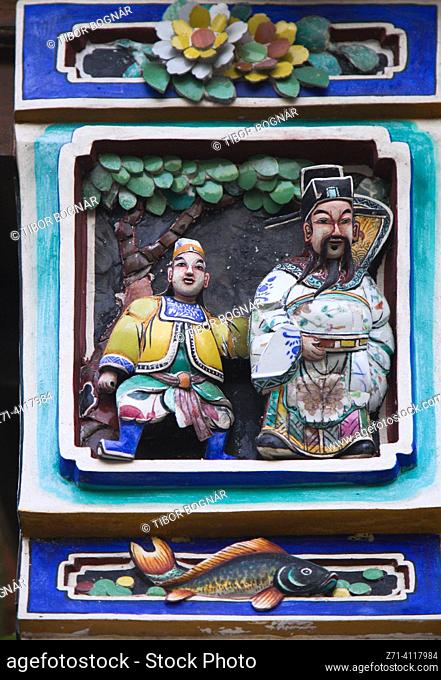 Malaysia, Penang, Georgetown, mural, relief, statues. In Georgetown, Penang, Malaysia, visitors can explore the many murals and relief sculptures scattered...