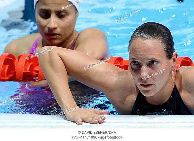 Isabelle Haerle of Germany (R) and Charetzeni Susana Escobar Torres of Mexico seen after the women's 800m Freestyle preliminaries at the 15th FINA Swimming...