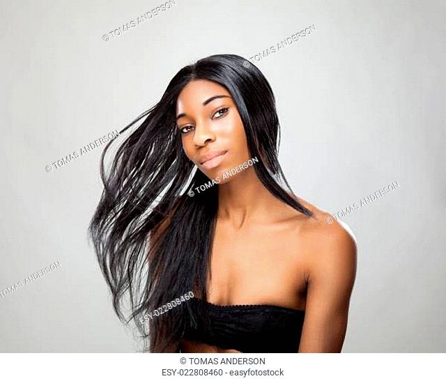 Black woman with long straight hair