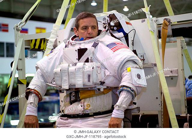 Astronaut William S. McArthur, Jr., Expedition 12 commander and NASA Space Station science officer, attired in a training version of the Extravehicular Mobility...