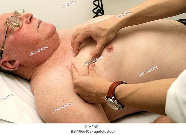 MONITORING A PACEMAKER<BR>Photo essay from hospital.<BR>Cardiology consultation. The doctor verifies pacemaker position