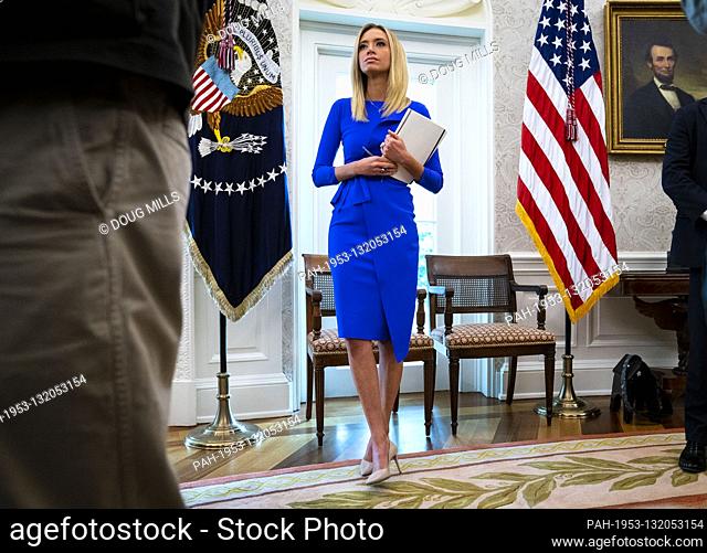 White House Press Secretary Kayleigh McEnany looks on as United States President Donald J. Trump makes remarks as he meets with Governor Ron DeSantis...