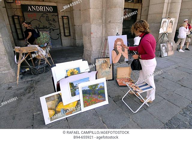 Artists. Plaza Mayor. Madrid. Spain