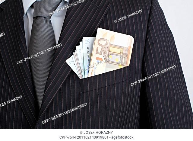 corruption, embracery, bribe, bribery, briber, banknotes, black money, euro, EUR, currency, crime, jacket, pocket, young man CTK Photo/Josef Horazny *MODEL...