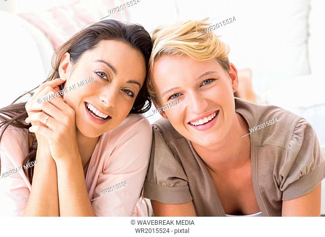 Portrait of smiling homosexual couple looking at camera
