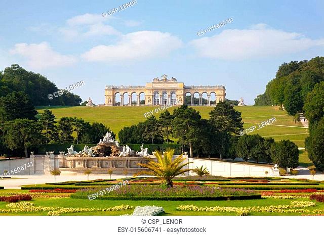 View on Gloriette structure and Neptune fountain in Schonbrunn Palace, Vienna, Austria