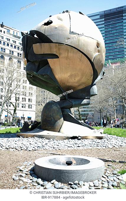 Golden ball, The Sphere, by the German sculptor Fritz Koenig at the World Trade Center site in New York, withstood the collapse of the Twin Towers with heavy...