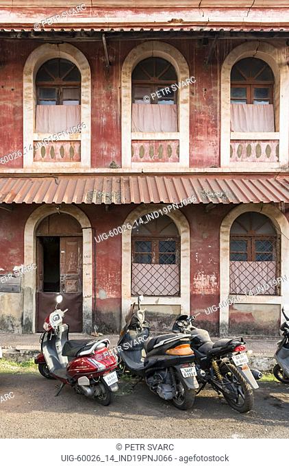 Motorbikes in front of an old house in Fontainhas, Panaji (Panjim), Goa, India