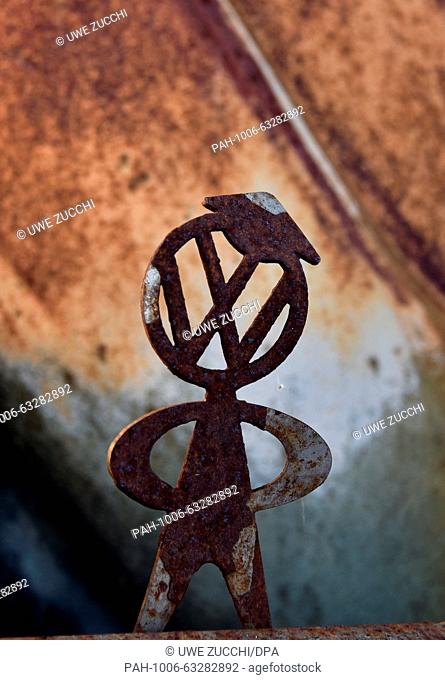 A rusty Volkswagen man stands on the bumper of a VW Beetle in the Beetle garage in Usseln, Germany, 04 November 2015. VW announces hundreds of thousands of...