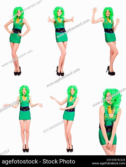 Young woman in green mini dress isolated on white
