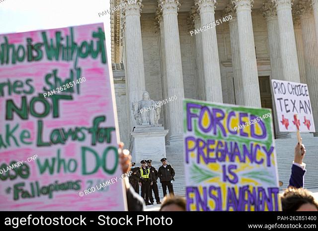 Pro-choice and anti-abortion activists hold their rallies in front of the Supreme Court of the United States in Washington, DC, Monday, November 1, 2021