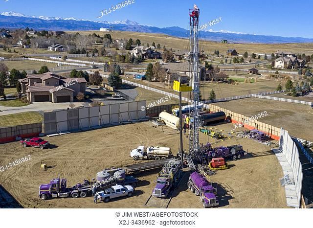 Broomfield, Colorado - An oil drilling rig next to homes in a fast-growing suburb of Denver. Concerned about climate change and health impacts