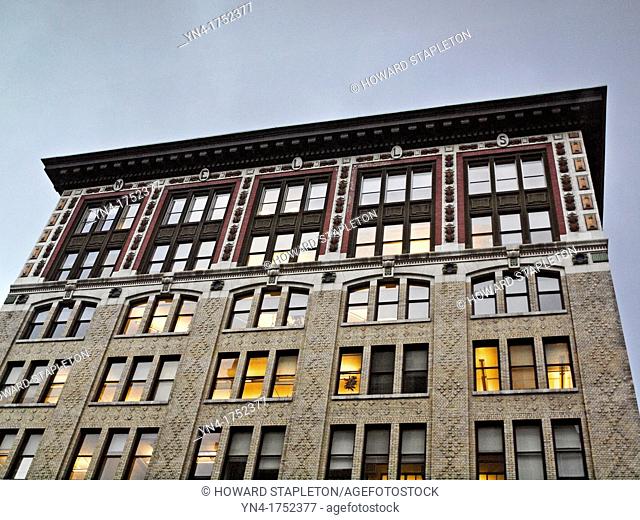 Wells Fargo Building at dusk in Portland, Oregon  This historic building was built in 1907  It was Portland's first steel framed building and at 12 stories was...