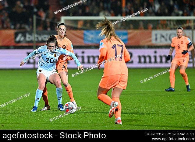 Marie Detruyer (20) of Belgium and Merel Van Dongen (5) of Netherlands pictured during a female soccer game between the national teams of The Netherlands
