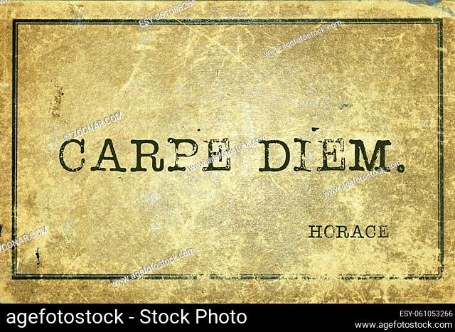 Carpe diem - ancient Roman poet Horace quote printed on grunge vintage cardboard