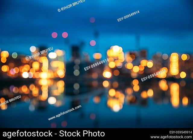 Oslo, Norway. Night Abstract Boke Bokeh Background Effect. Design Backdrop. Night View Embankment And Residential Multi-storey House In Gamle Oslo District