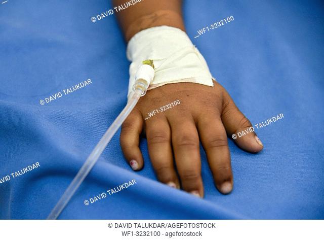 World Cancer Day. Guwahati, Assam, India. 4 February 2019. A hand of a child Cancer patient with cannula at Dr. Bhubaneswar Borooah Cancer Institute and...