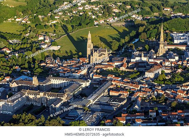 France, Vendee, Saint Laurent sur Sevre, Saint Louis Marie Grignion de Monfort basilica, La Sagesse chapel and the village (aerial view)
