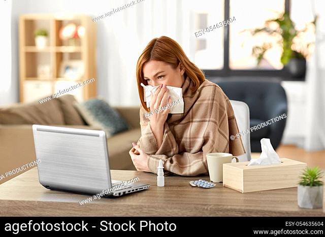 sick woman having video call on tablet pc at home