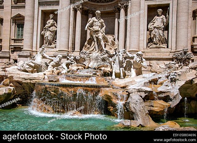 Overview of the world-famous Trevi Fountain in sunny day at the city center of Rome, the incredible city of the Ancient Era, known as The Eternal City