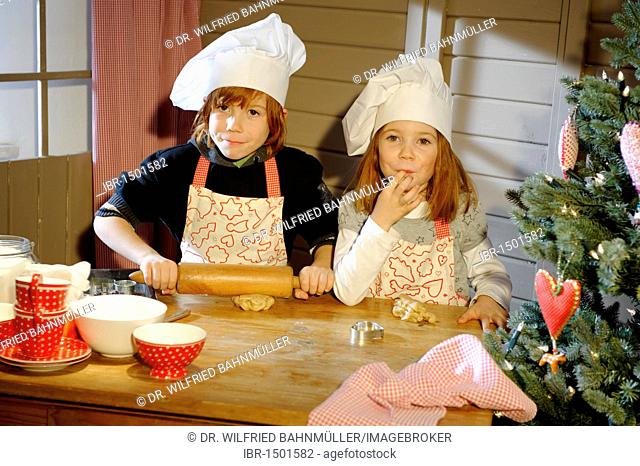 Christmas bakery, children baking cookies