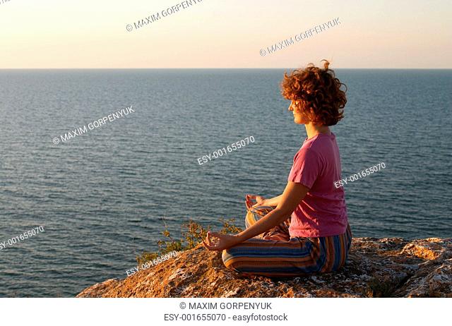 girl meditating in padmasana pose