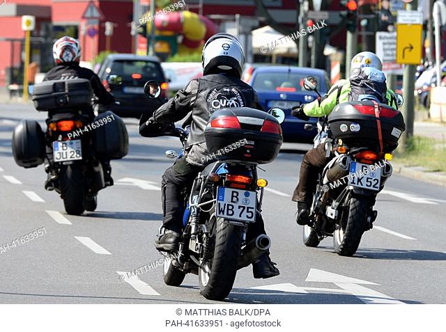 Motorcycles are driven at the start of the motorcycle pilgrimage to Santiago de Compostela in Berlin-Alt-Mariendorf,  Germany, 10 August 2013