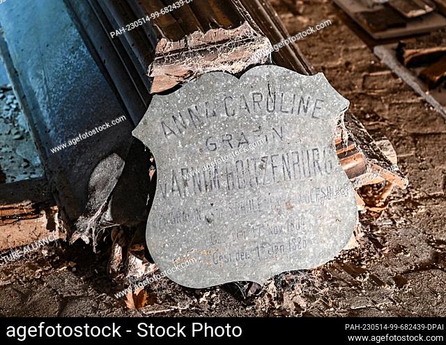 PRODUCTION - 22 April 2023, Brandenburg, Boitzenburg: The name ""Anna Caroline Countess von Arnim-Boitzenburg"" is written on a zinc plaque on a collapsed...