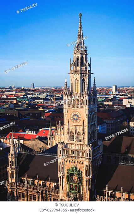 Beautiful super wide-angle sunny aerial view of Munich, Bayern, Germany with skyline and scenery beyond the city, seen from the observation deck of St