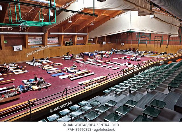 An emergency shelter is set up for flood victims in a gymnasium in Bitterfeld-Wolfen, Germany, 04 June 2013. Around 10, 000 people had to leave their houses...