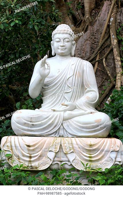 Marble moutain. Shakyamuni Buddha. The Vitarka mudra is the gesture of discussion and transmission of Buddhist teaching. Marble statue. Danang