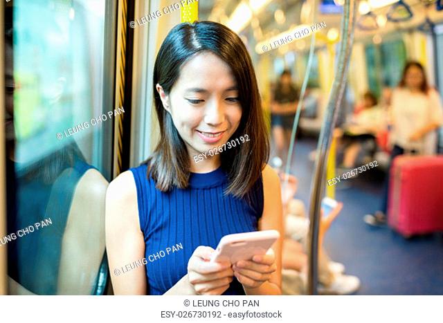 Woman holding a mobile phone