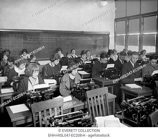 Male and female high school typing class in Washington, D.C., 1915-1920. Typing was an important job skill for work in government offices (BSLOC-2018-3-92)