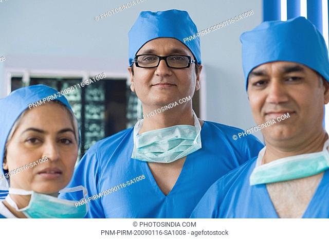Portrait of three surgeons, Gurgaon, Haryana, India