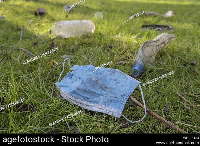 Face mask and other plastic trash in Kartal Eco Park. Coronavirus is contributing to pollution, as discarded face masks clutter parks along with plastic and...