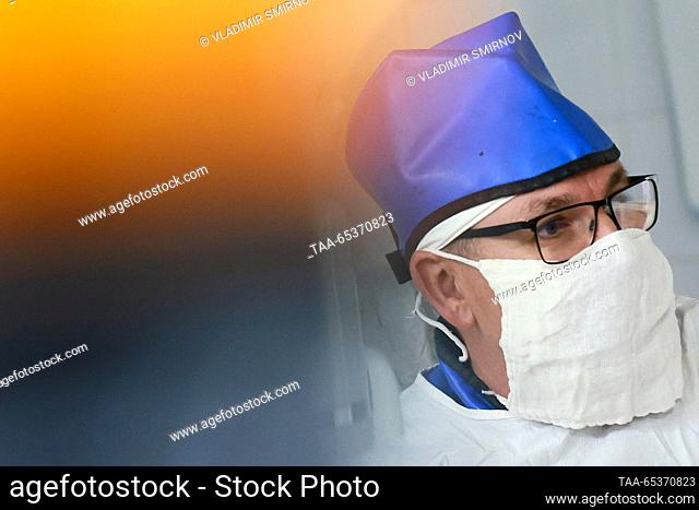 RUSSIA, IVANOVO - NOVEMBER 30, 2023: Doctor Pavel Solomatnikov performs a lithotripsy using thulium fibre laser at the urology department of City Clinical...